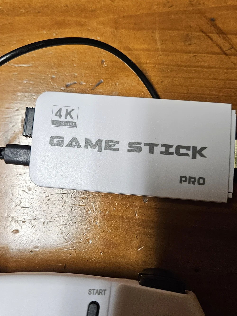 4K Game Stick with Two White Wireless Controllers